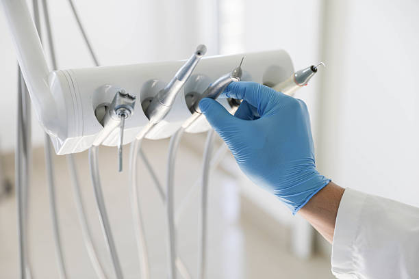 Professional Emergency Dentist technician working in Cheltenham Village, PA